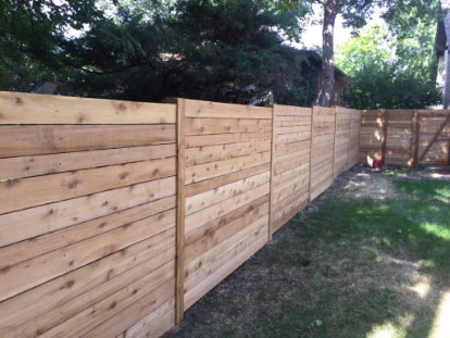 Horizontal solid wood fence