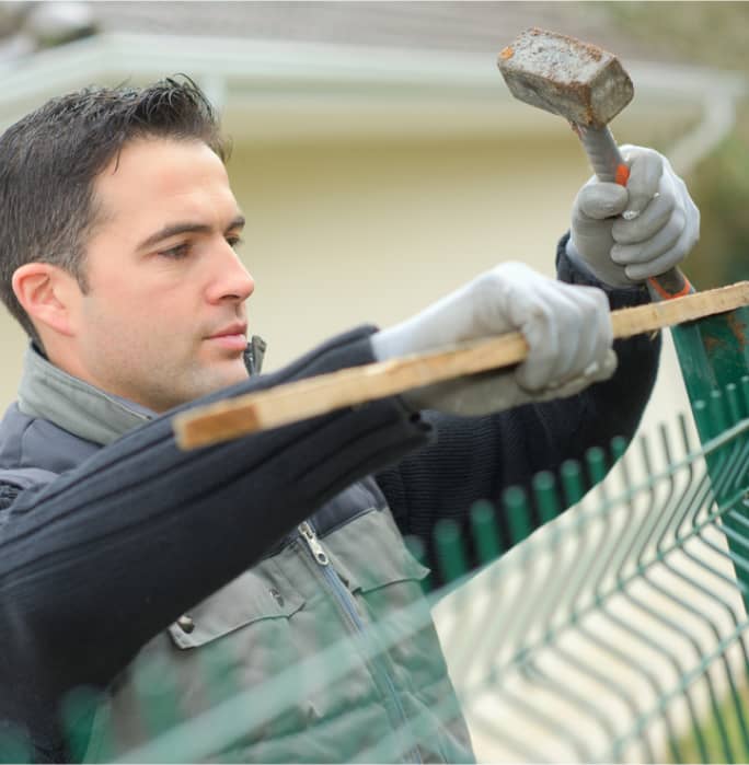 img - man-fixing-fence-and-man